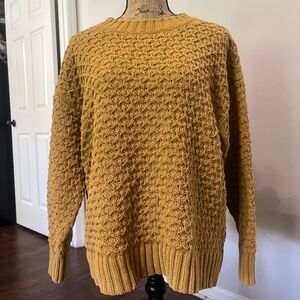 Yellow cable knit sweater
